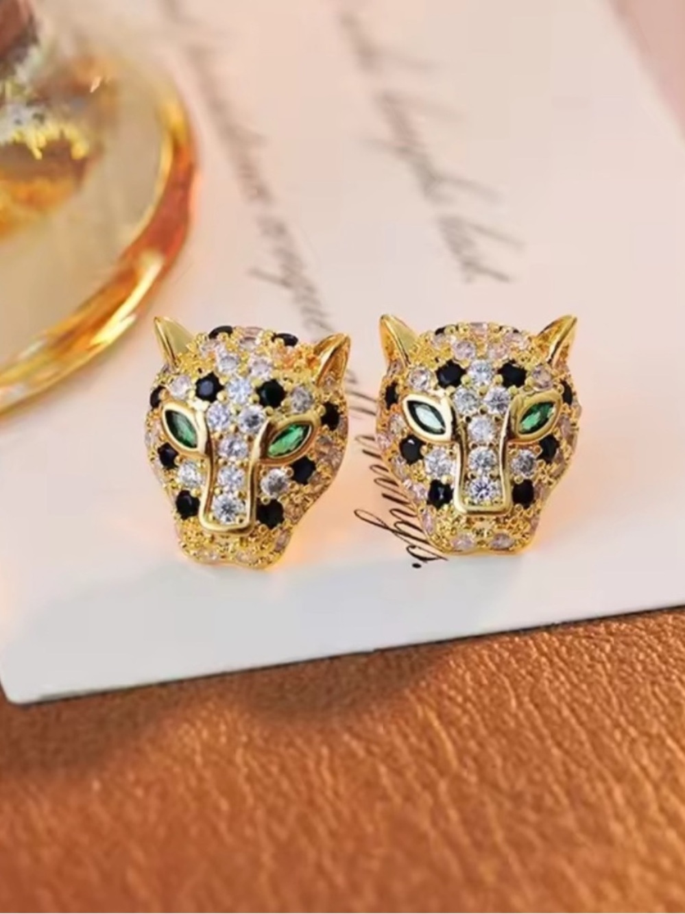 Gold Leopard Head Earrings with Green and Black Accents